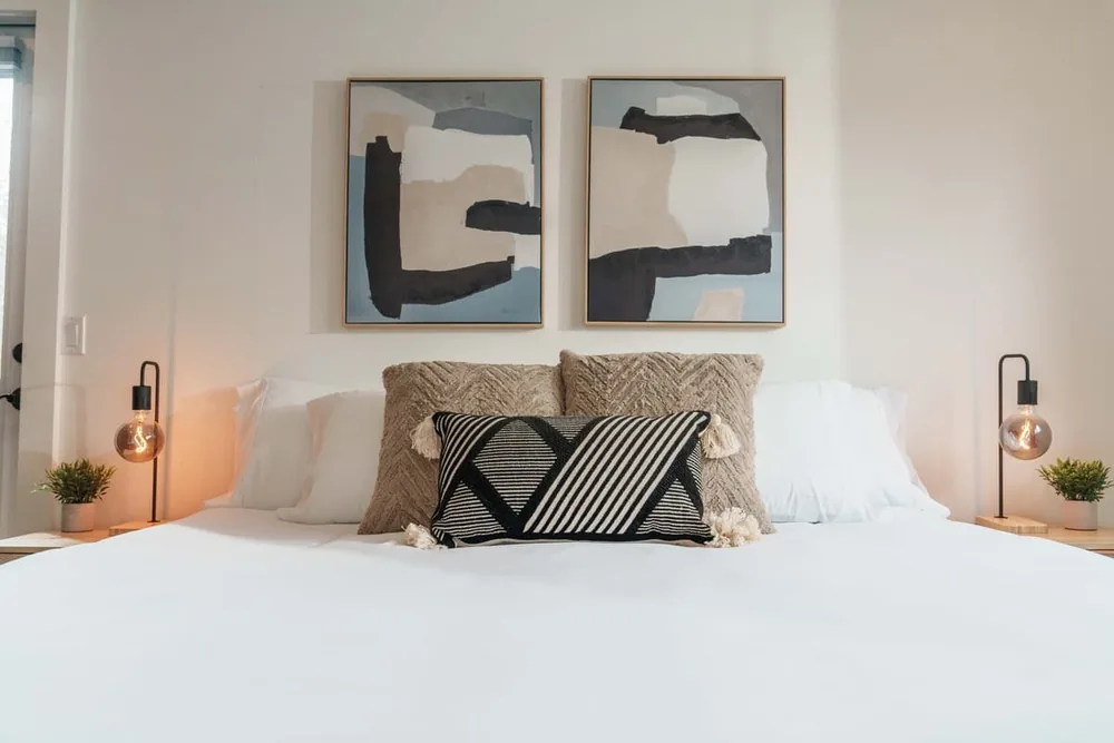 Calm primary bedroom at The Bruno